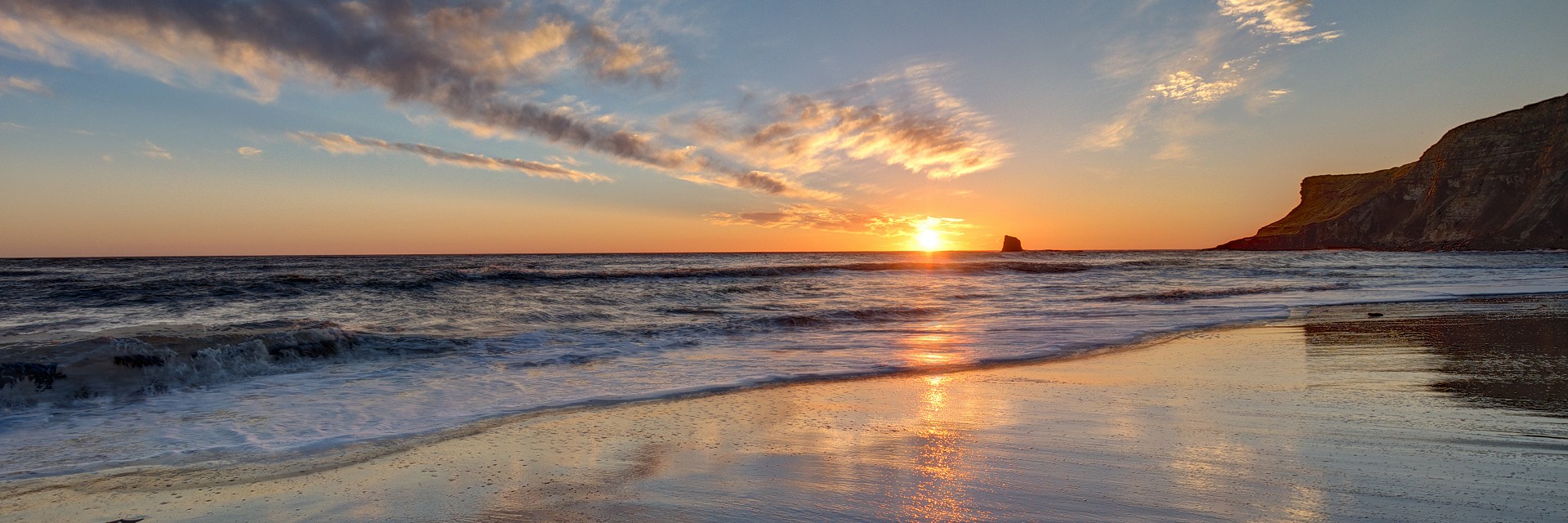 Whitby beach at sunrise